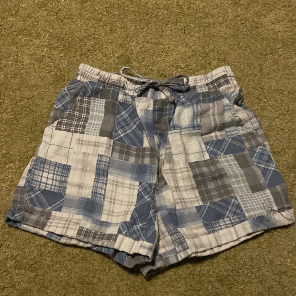 Cute blue shorts that have multiple blue patches/patterns!